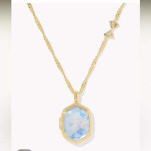 Kendra Scott + Loveshack Fancy. Gold Necklace with Blue Pendant locket necklace